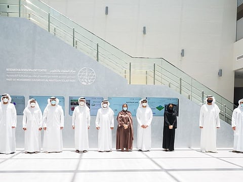 Officials of the Ministry of Climate Change and Environment and Dewa at the meeting.