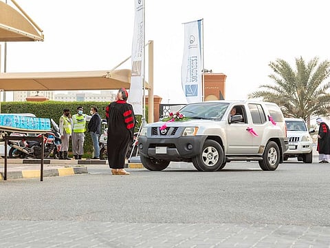 Ajman University of Science and Technology will hold its second drive-through graduation ceremony this year. Photo of graduation held early this year.