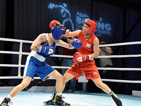 India's Mary Kom in action against Nazym Kyzaibay of Kazakhstan during women’s 51kg final bout at the ASBC Asian Boxing Championships 2021 in Dubai