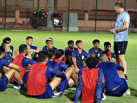 Members of Indian football team are all ears to head coach Igor Stimac (right) during their build-up camp in Doha.