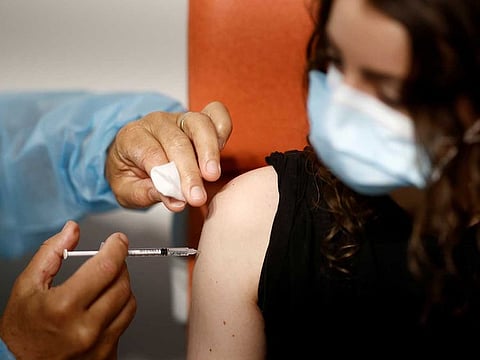 A medical worker administers a dose of the "Comirnaty" Pfizer BioNTech COVID-19 vaccine in a vaccination centre in Nantes as part of the coronavirus disease (COVID-19) vaccination campaign in France, June 3, 2021.