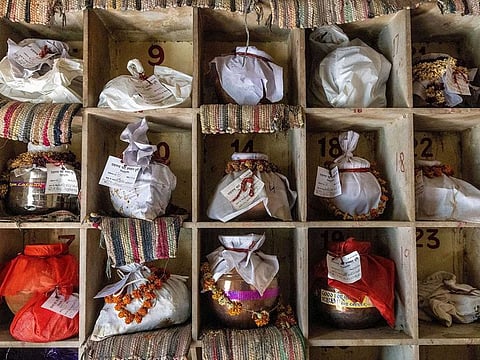 Urns containing ashes after final rites of people including those who died from complications related to the coronavirus disease (COVID-19), await immersion due to lockdown, at a crematorium in New Delhi, India, May 6, 2021.