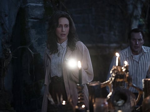 Vera Farmiga, left, and Patrick Wilson in a scene from "The Conjuring: The Devil Made Me Do It."