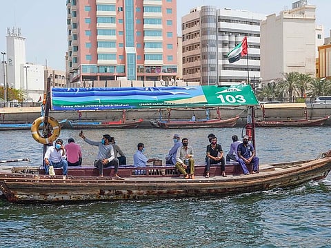 The traditional Abras in Dubai Creek ferry around 13 million riders annually