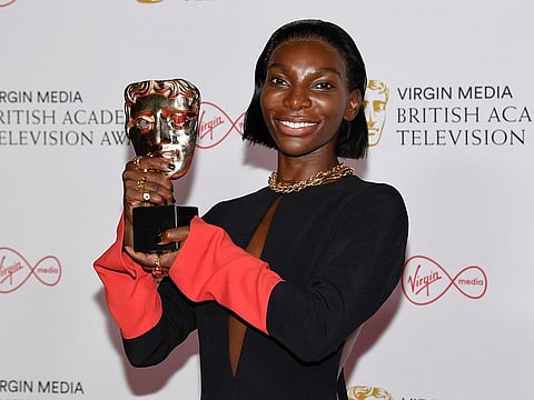 Michaela Coel poses for photographers with his Leading Actress award for her role in 'I May Destroy You' backstage at the British Academy Television Awards in London, Sunday, June 6, 2021.