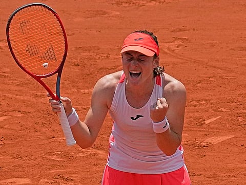 Slovenia's Tamara Zidansek clelebrates after beating Spain's Paula Badosa in their quarter final match of the French Open tennis at the Roland Garros on Tuesday.