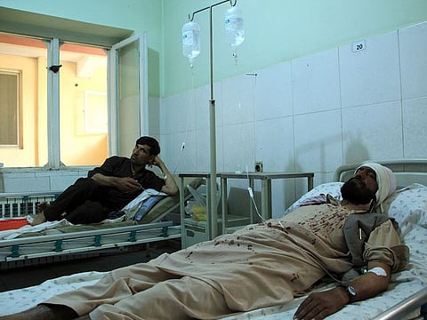 Injured workers of HALO Trust de-mining organisation are treated at a hospital in northern Baghlan province, Afghanistan, Wednesday, June 9, 2021. Workers of the organisation were attacked on Tuesday night by the armed gunmen.