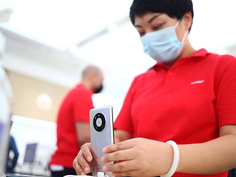 People enjoy a hands-on experience of the new products at the Huawei Experience Store in Dubai on 9th June, 2021. Photo Clint Egbert/Gulf News