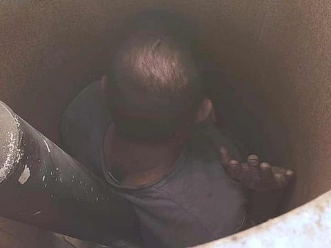 This photo provided by the Sonoma County Sheriff's Office shows a man who was found stuck inside a giant fan at a vineyard in Santa Rosa, California.