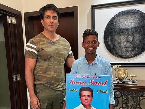 Sonu Sood with a fan who walked from Hyderabad to Mumbai to meet him.