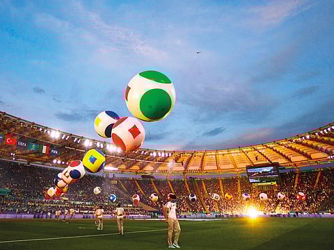 Entertainers perform during the opening ceremony before the UEFA EURO 2020 Group A football match between Turkey and Italy at the Olympic Stadium in Rome on June 11, 2021