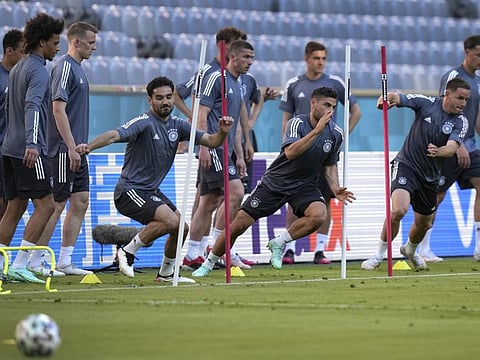 Germany's Ilkay Gundogan, fourth left, runs during a team training session at Allianz Arena stadium in Munich before the Euro 2020 championship Group F match against France.