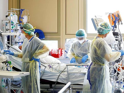 File photo: A patient suffering from COVID-19 receives treatment at the ICU of the "Klinikum Darmstadt" clinic in Darmstadt, Germany.