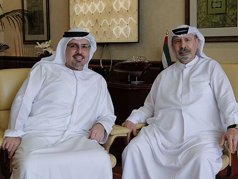 Mohammed Mohebi, left, and Mahmood Mohebi, grandson and son of Baqer Mohebi respectively, during an interview with Gulf News.