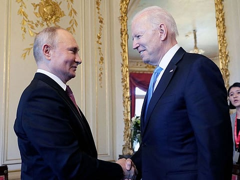 Russian President Vladimir Putin (L) shakes hands with U.S President Joe Biden during their meeting at the 'Villa la Grange' in Geneva, Switzerland in Geneva on June 16, 2021.