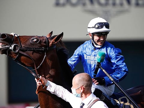 Jockey Marco Ghiani is all smiles after riding Godolphin's Real World to Royal Hunt Cup on the second day of Royal Ascot festival on Wednesday.