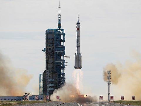 FILE IMAGE FOR ILLUSTRATIVE PURPOSES ONLY: A Long March-2F Y12 rocket, carrying the Shenzhou-12 spacecraft and three astronauts, takes off from Jiuquan Satellite Launch Center for China's first manned mission to build its space station, near Jiuquan, Gansu province, China June 17, 2021.