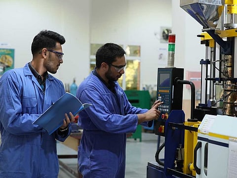 Students at BITS Pilani Dubai Campus work on an engineering project
