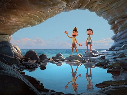 This image released by Disney shows characters Alberto, voiced by Jack Dylan Grazer, left, and Luca, voiced by Jacob Tremblay in a scene from the animated film "Luca."