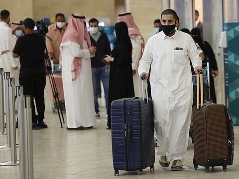 Saudi passengers arrive to King Khaled International airport in the capital Riyadh.