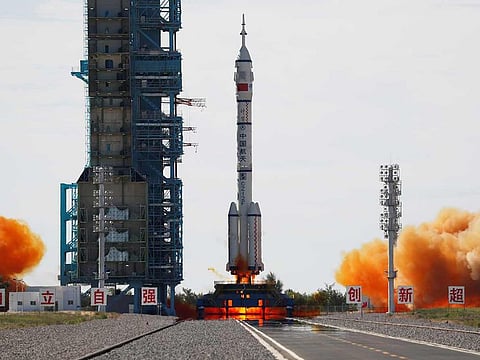 The Long March-2F Y12 rocket, carrying the Shenzhou-12 spacecraft and three astronauts, takes off from Jiuquan Satellite Launch Center for China's first manned mission to build its space station, near Jiuquan, Gansu province, China June 17, 2021.
