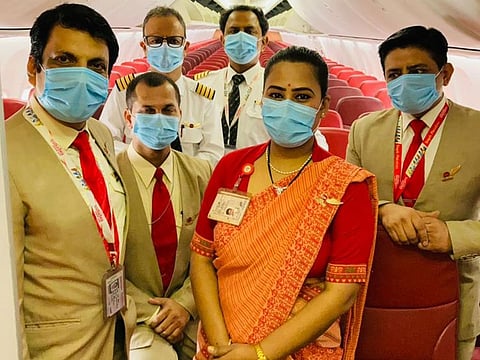 Air Indian Express vaccinated crew members on their first international flight.