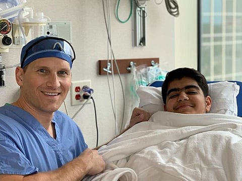 Dr Aaron Krych with Ahmad Amer Sharif after the surgery.