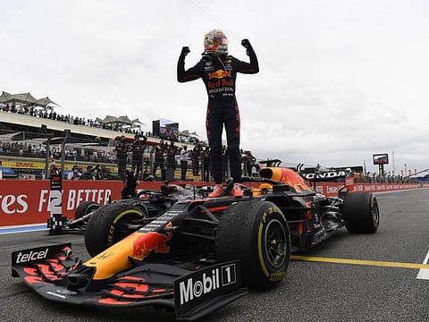 Red Bull's Max Verstappen celebrates after winning the French Grand Prix.