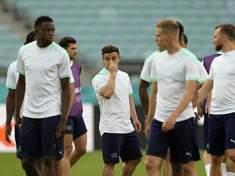 Switzerland's Xherdan Shaqiri (centre) looks on during a team training session at the Baku Olympic Stadium in Baku, Azerbaijan. Today, Switzerland face Turkey in the Euro 2020 championship Group A match and they both need a win to stand a chance to progress to the last 16 of the tournament.