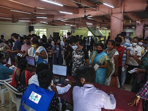 People enroll their names to be administered the Covishield, Serum Institute of India's version of the AstraZeneca vaccine, during a special drive held in Hyderabad on June 21, 2021.