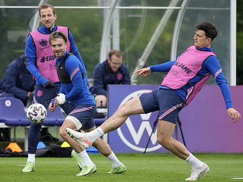 England's Harry Kane (left) Jack Grealish (centre) and Harry Maguire during a team training session at Tottenham Hotspur training ground in London ahead of their Euro 2020 championship Group D match against Czech Republic.