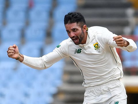 Keshav Maharaj of South Africa celebrates the dismissal of Jason Holder of West Indies, the second wicket of his hat-trick spell, on way to their series win at St.Lucia.