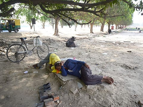 In this file photograph taken on June 2, 2019, Indian villagers rest under a tree during a hot summer afternoon in Allahabad, as temperatures passed 50 degrees Celsius in northern India as an unrelenting heatwave triggered warnings of water shortages and heatstroke.