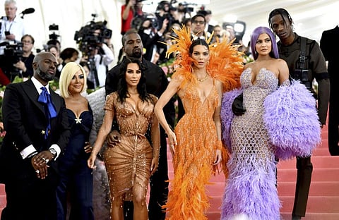 Corey Gamble, from left, Kris Jenner, Kim Kardashian, Kanye West, Kendall Jenner, Kylie Jenner and Travis Scott attend The Metropolitan Museum of Art's Costume Institute benefit gala in New York on May 6, 2019.