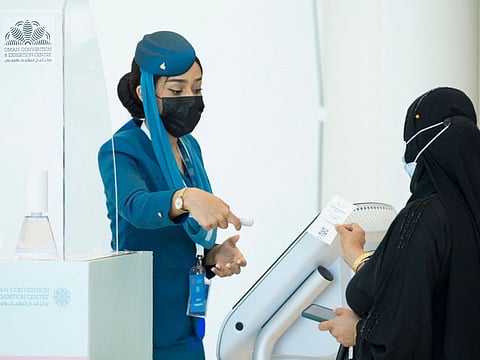 A woman arrives to get vaccinated at the Oman Convention & Exhibition Centre in the capital Muscat on June 23, 2021 during the second phase of the national immunisation plan against COVID-19.