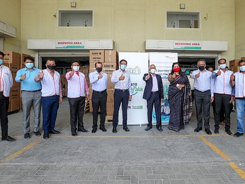 Representatives of Norka Roots and Aster Volunteers flag off the last batches of COVID-19 oxygen relief supplies to Kerala from Dubai.