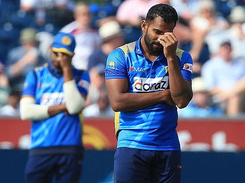 Sri Lankan bowler Chamika Karunaratne reacts during the first One-day International against England at Riverside Ground, Chester-le-Street, north England on Tuesday. The visitors lost the match by five wickets.
