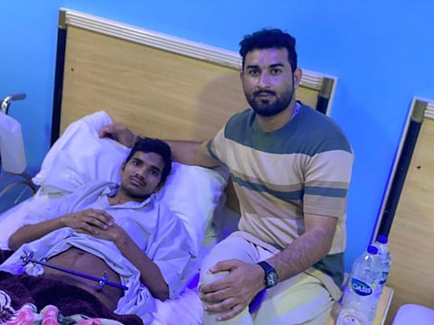 A thankful Shiv Poojan Sanwal with Usman Ullah Mir Dil Khan