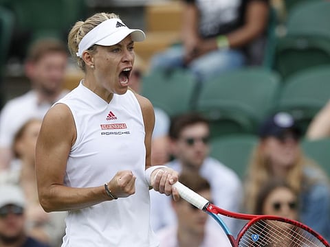 Germany's Angelique Kerber celebrates winning her third round match against Belarus' Aliaksandra Sasnovich.
