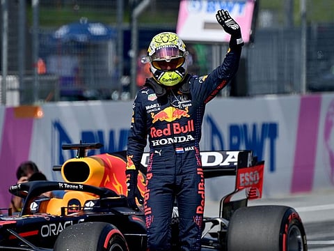 Red Bull's Dutch driver Max Verstappen reacts after winning the qualifying session at the Red Bull Ring race track in Spielberg, Austria ahead of the Formula One Austrian Grand Prix.