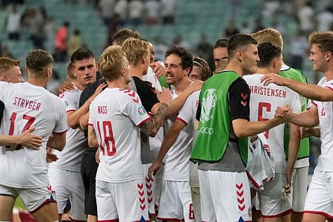 Denmark's players celebrate after winning the Euro 2020 quarter-final match against the Czech Republic at the Olympic Stadium in Baku.