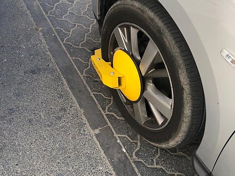 Wheel lock applied on an errant vehicle in Sharjah.