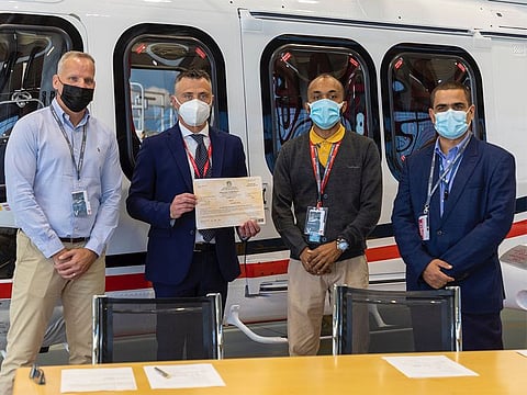 Officials at the signing of the agreement.