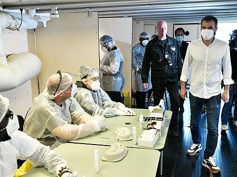 French Health Minister Olivier Veran visits a COVID-19 screening test facility set up at the 23rd edition of the festival dedicated this year to health workers, at the Hippodrome de Longchamp race course on July 4, 2021, in Paris.