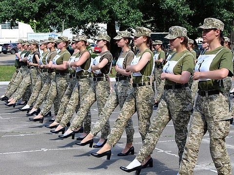 Ukrainian female soldiers wear heels while taking part in the the military parade rehearsal in Kyiv, Ukraine.