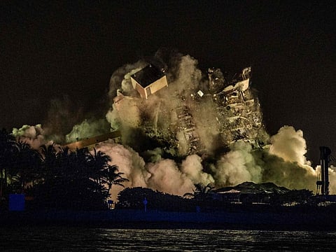 The rest of the Champlain South tower is being demolished in Surfside, Florida, north of Miami Beach, late on July 4, 2021.