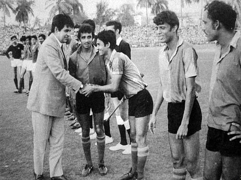 Dilip Kumar (left) being introduced to footballers of East Bengal and Mohun Bagan, the two Indian heavyweight clubs, during a Chief Guest ritual at the erstwhile Rovers Cup tournament in Mumbai.