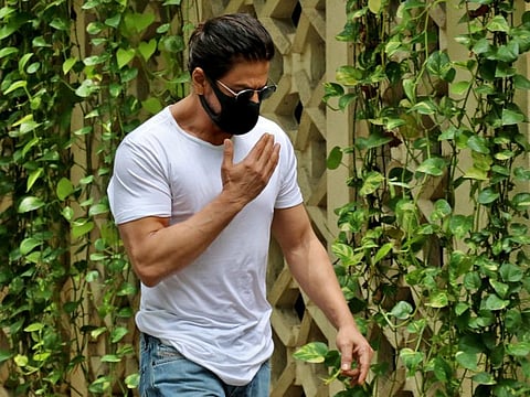 Actor Shah Rukh Khan arrives to pay his respect at the residence of Bollywood actor Dilip Kumar on July 7, 2021.
