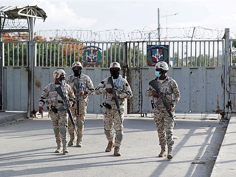 Members of the Dominican Republic's National Army guard the bridge between the Dominican Republic and Haiti, after the shared border was closed when Haiti's President Jovenel Moise was shot dead by gunmen at his private home in Port-au-Prince, in Dajabon, Dominican Republic July 7, 2021