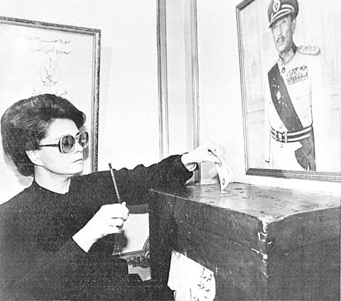 Jehan Sadat, widow of slain Egyptian President Anwar Sadat, is seen October 13, 1981 voting near her home in Giza at a local police station in a referendum to endorse Hosni Mubarak as her husband's successor. Sadat was assassinated October 6.